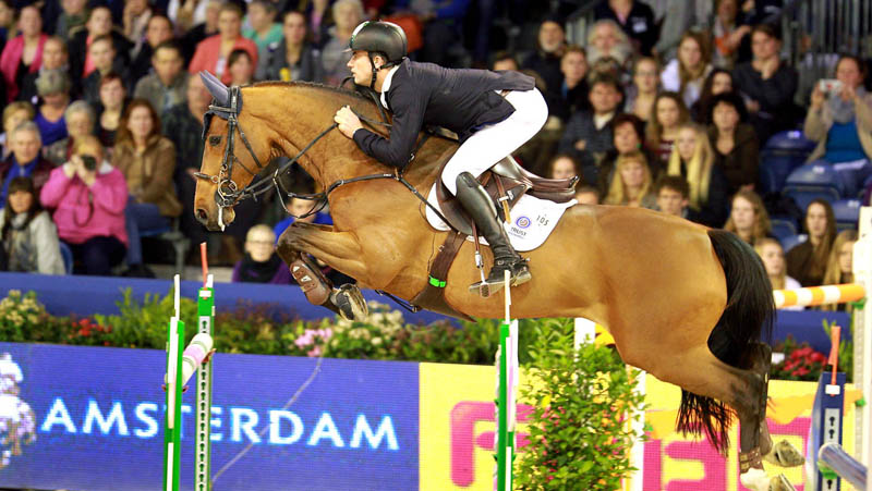 Gert-Jan Bruggink werd Primeval Dejavu tweede in de Grote Prijs van Jumping Amsterdam. ©Jacob Melissen