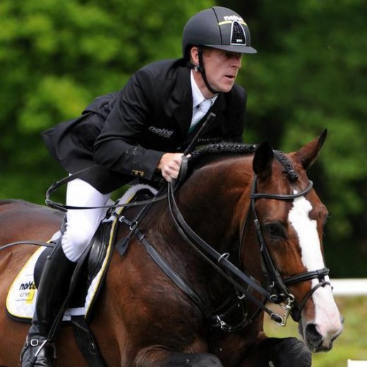 Marcus Ehning met Plot Blue.
