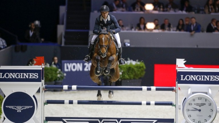 Steve Guerdat met Nino de Buissonnets (archief). foto: FEI | Dirk Caremans